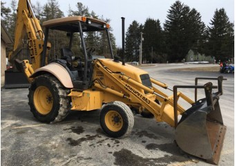 Экскаватор-погрузчик New holland 555 e